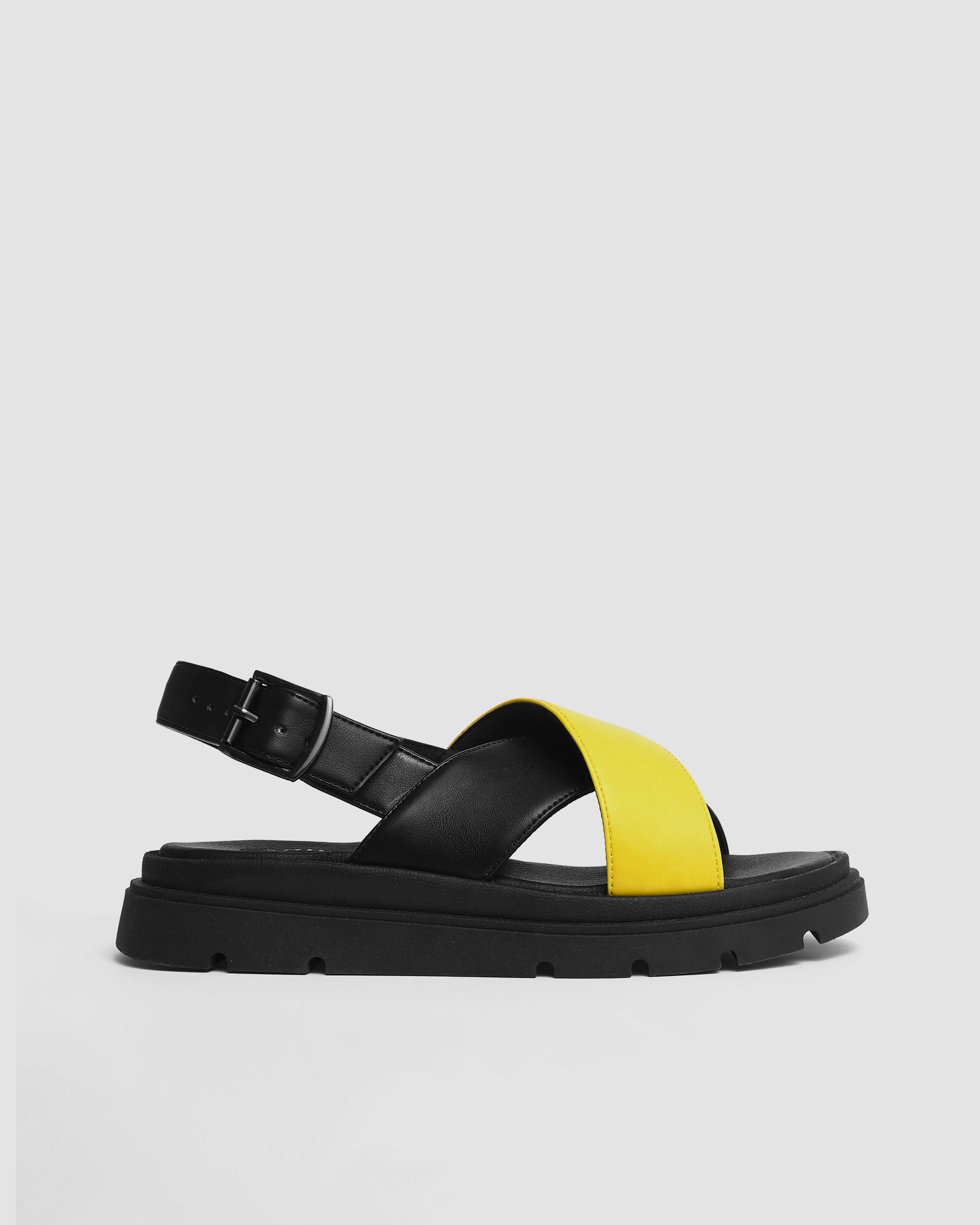 BOHEMA Glare Sandals in lemon yellow - side view of women's heeled sandals