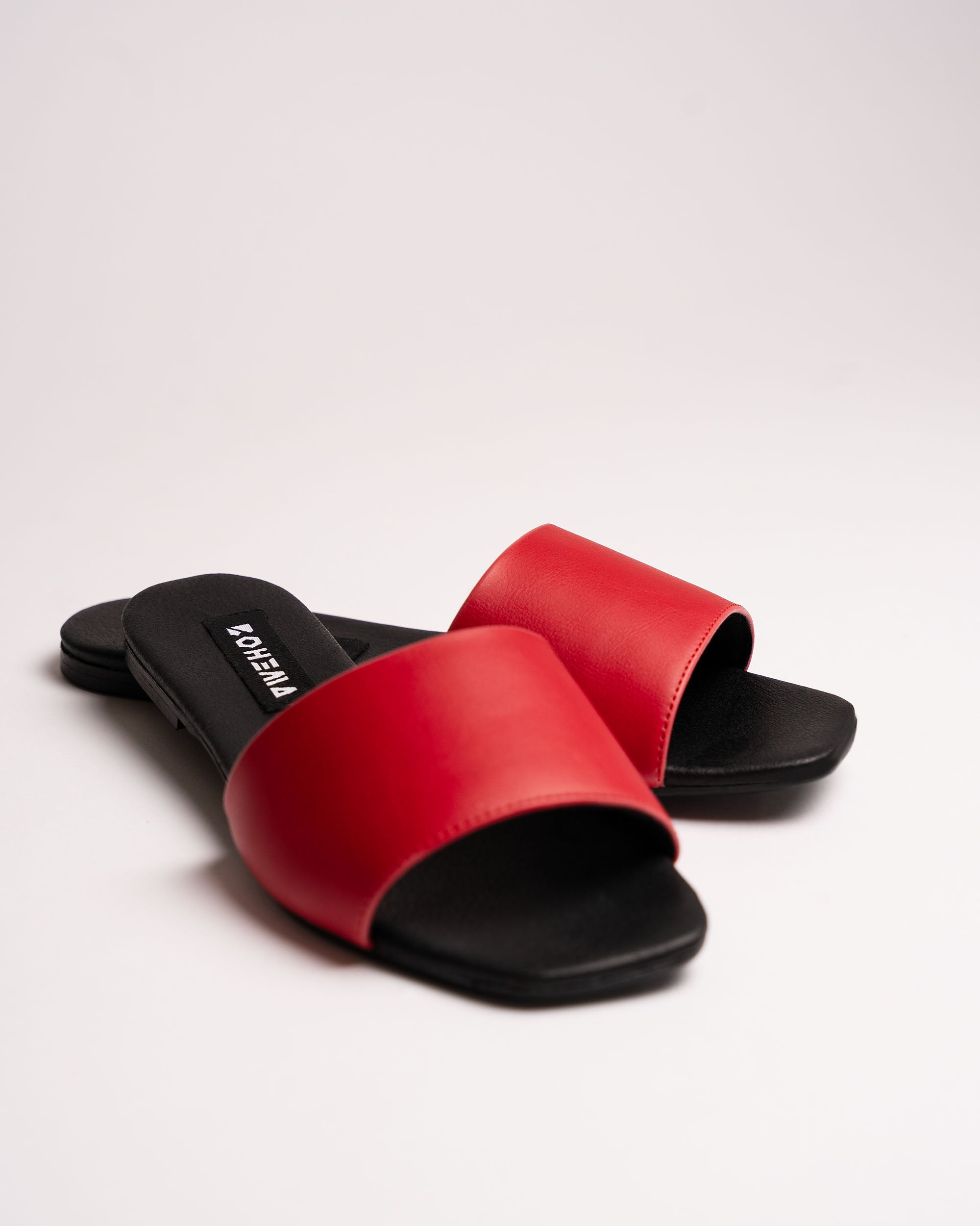 BOHEMA Mellow Slides in red - side view of women's slides