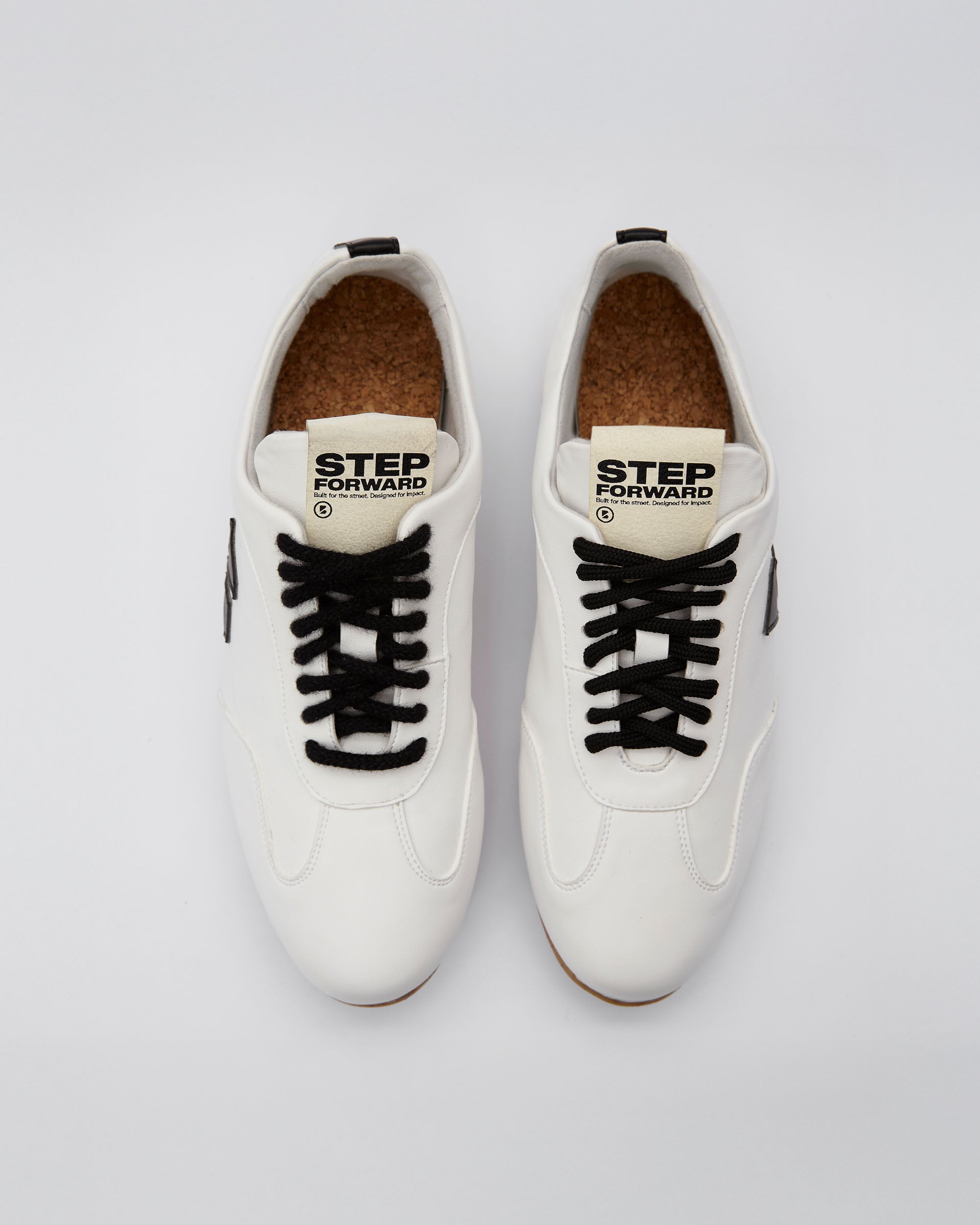 BOHEMA Racer Sneakers in white - side view of women's sneakers