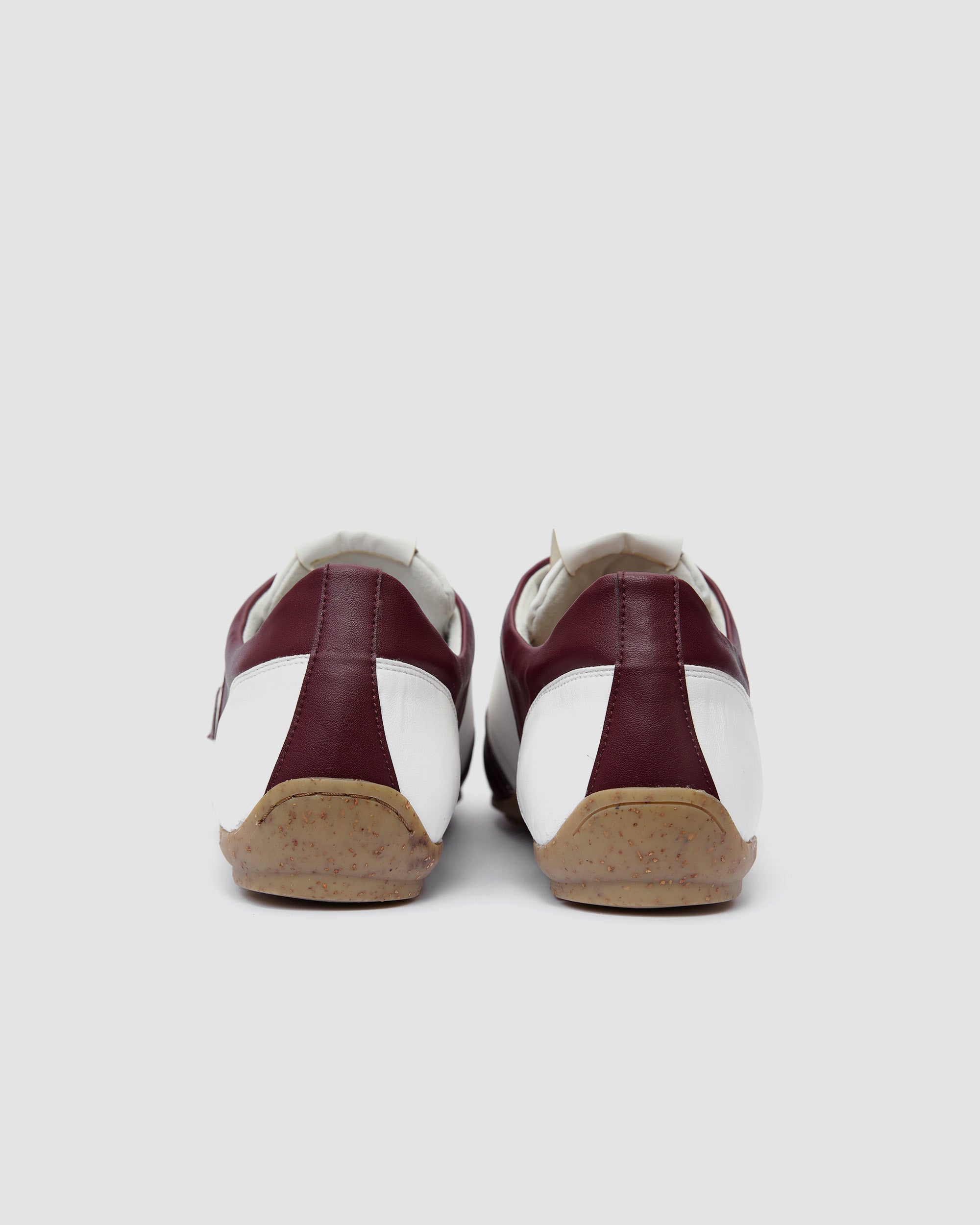 BOHEMA Racer Sneakers in burgundy and white - worn on foot of women's sneakers