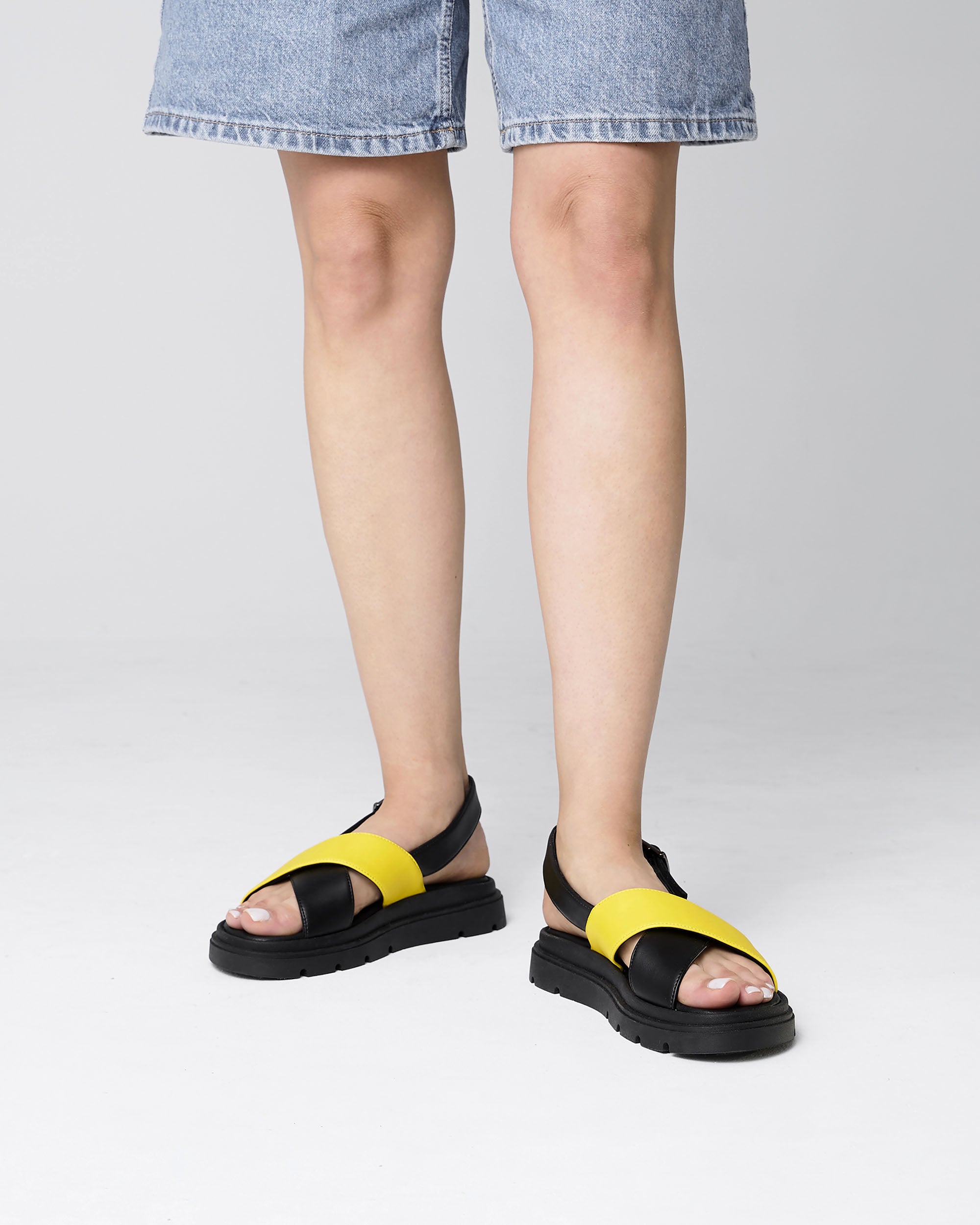 BOHEMA Glare Sandals in lemon yellow - texture close-up of women's heeled sandals
