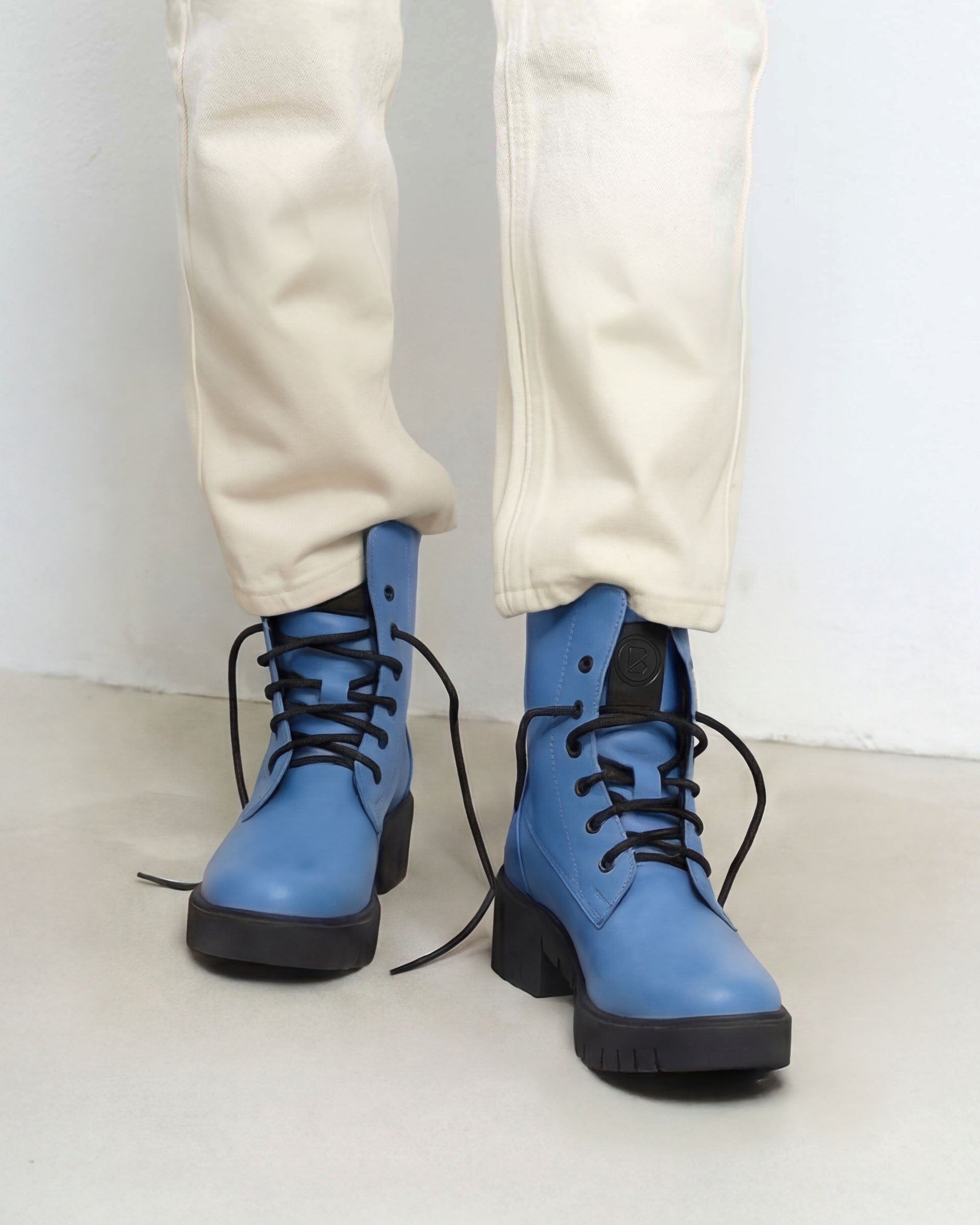 BOHEMA Workers No. 3 in baby blue - side view of women's lace-up boots