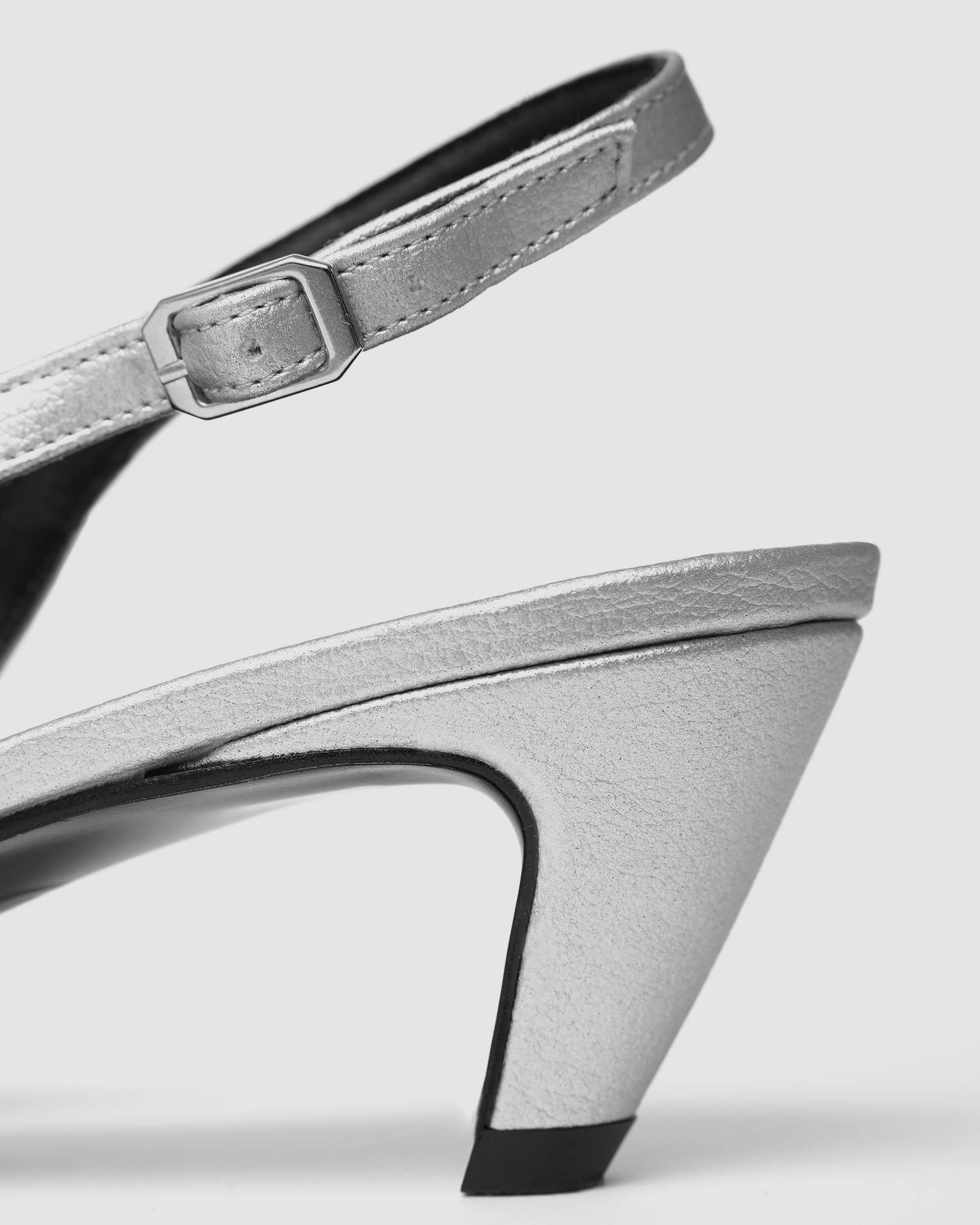 BOHEMA Kitten Heels in silver - worn on foot of women's kitten heel pumps