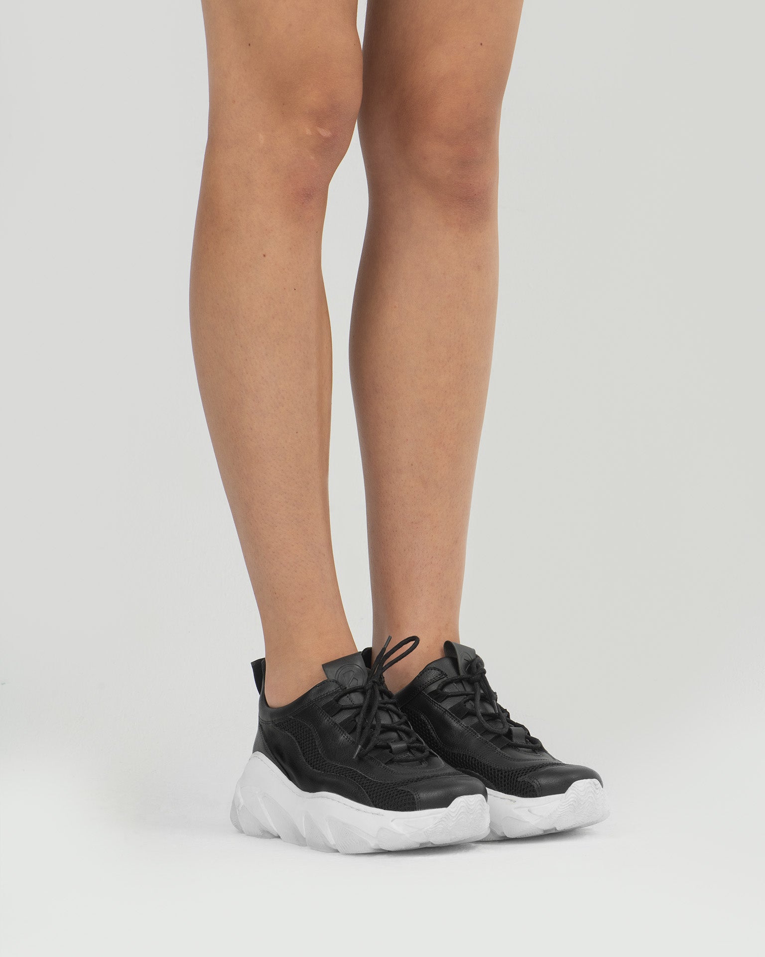 BOHEMA Daddy's Sneakers in black - side view of women's chunky sneakers