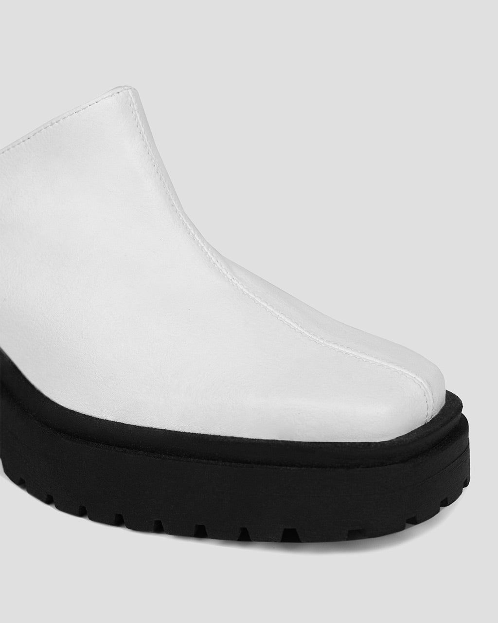 BOHEMA Squared Mule in white - worn on foot of women's mules