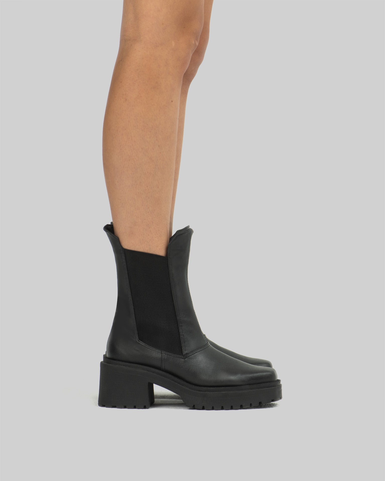 BOHEMA Squared Chelsea Boots in black - back view of women's chelsea boots