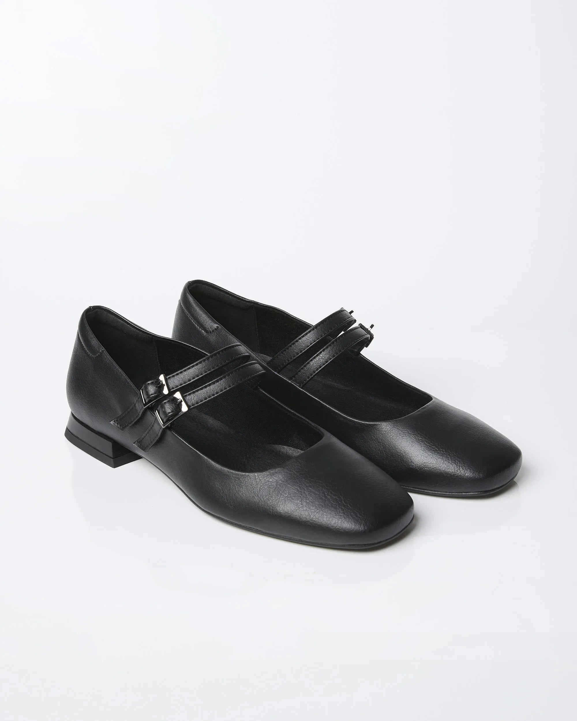 BOHEMA Blackberry Mary Jane Pumps in black - worn on foot of women's Mary Jane ballet flats
