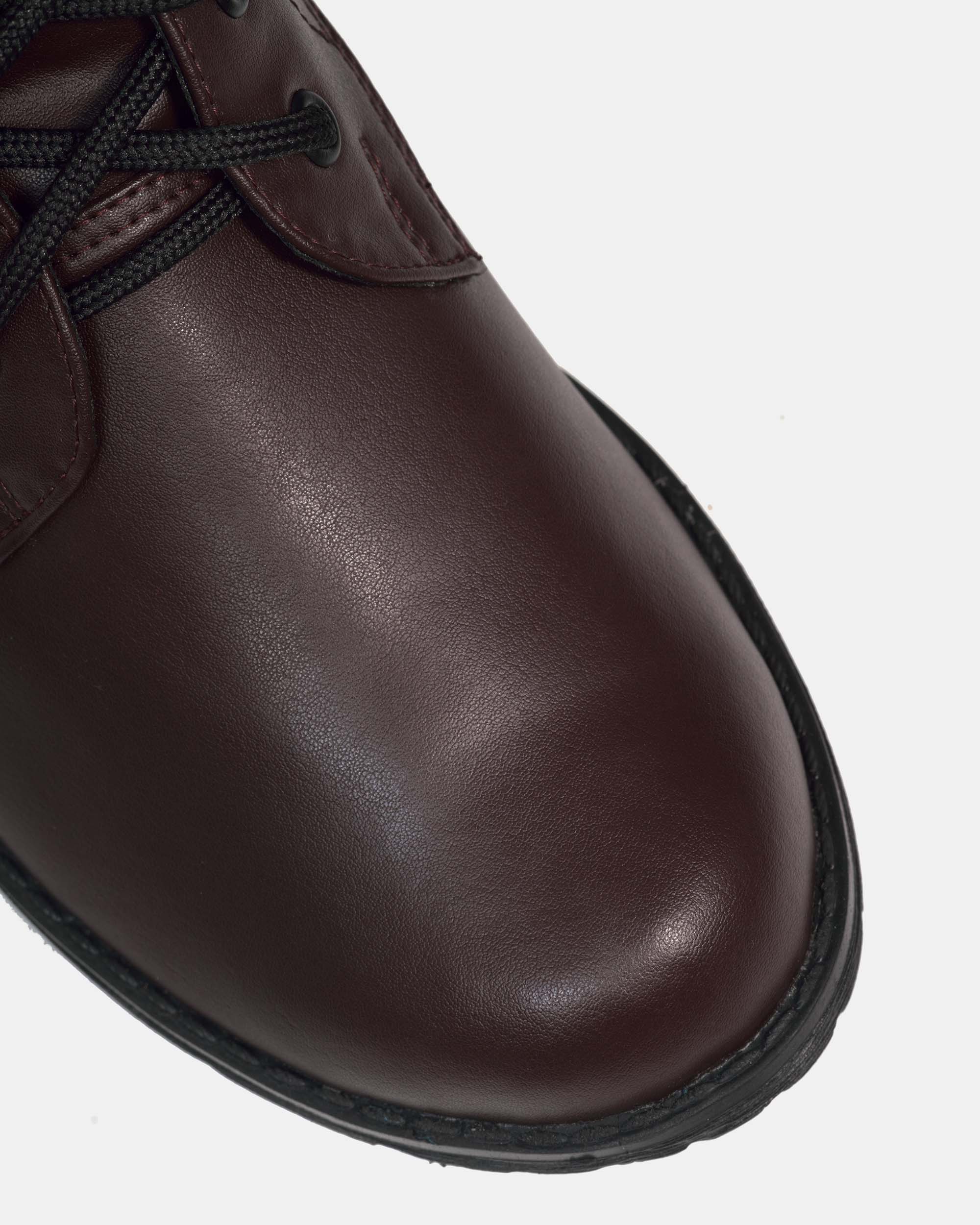 BOHEMA Workers No. 2 in chocolate brown - worn on foot of women's lace-up boots