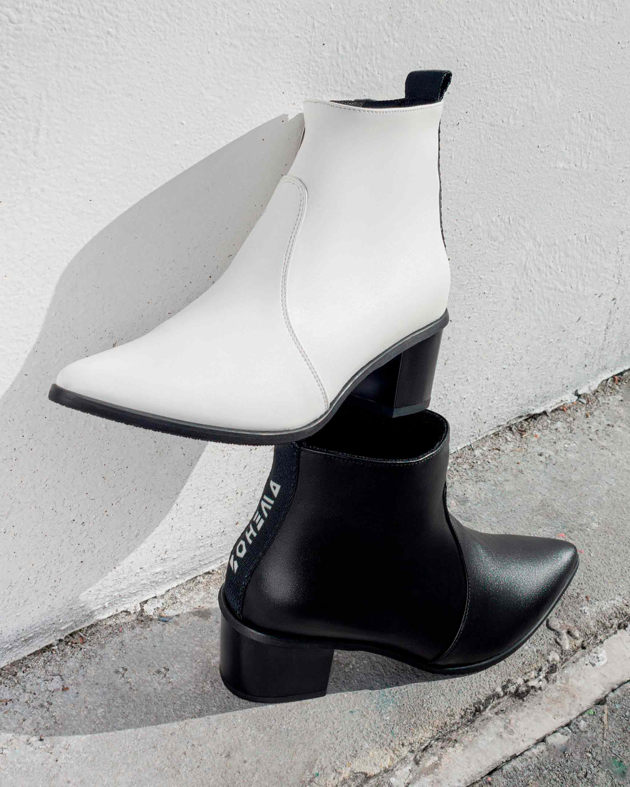 BOHEMA Swan No. 1 in white - worn on foot of women's boots