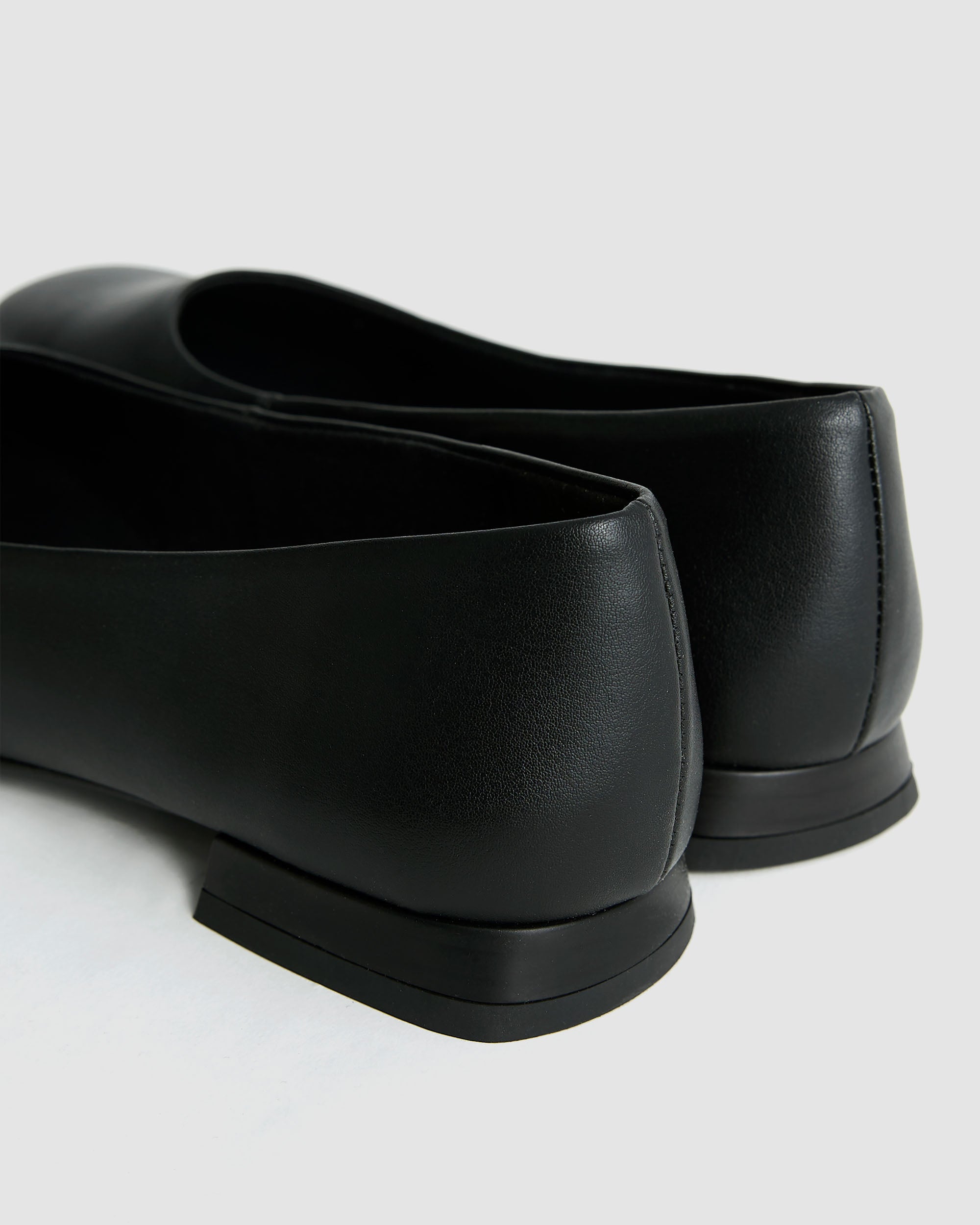 BOHEMA Black Diana Pumps in black - worn on foot of women's square-toe ballet flats