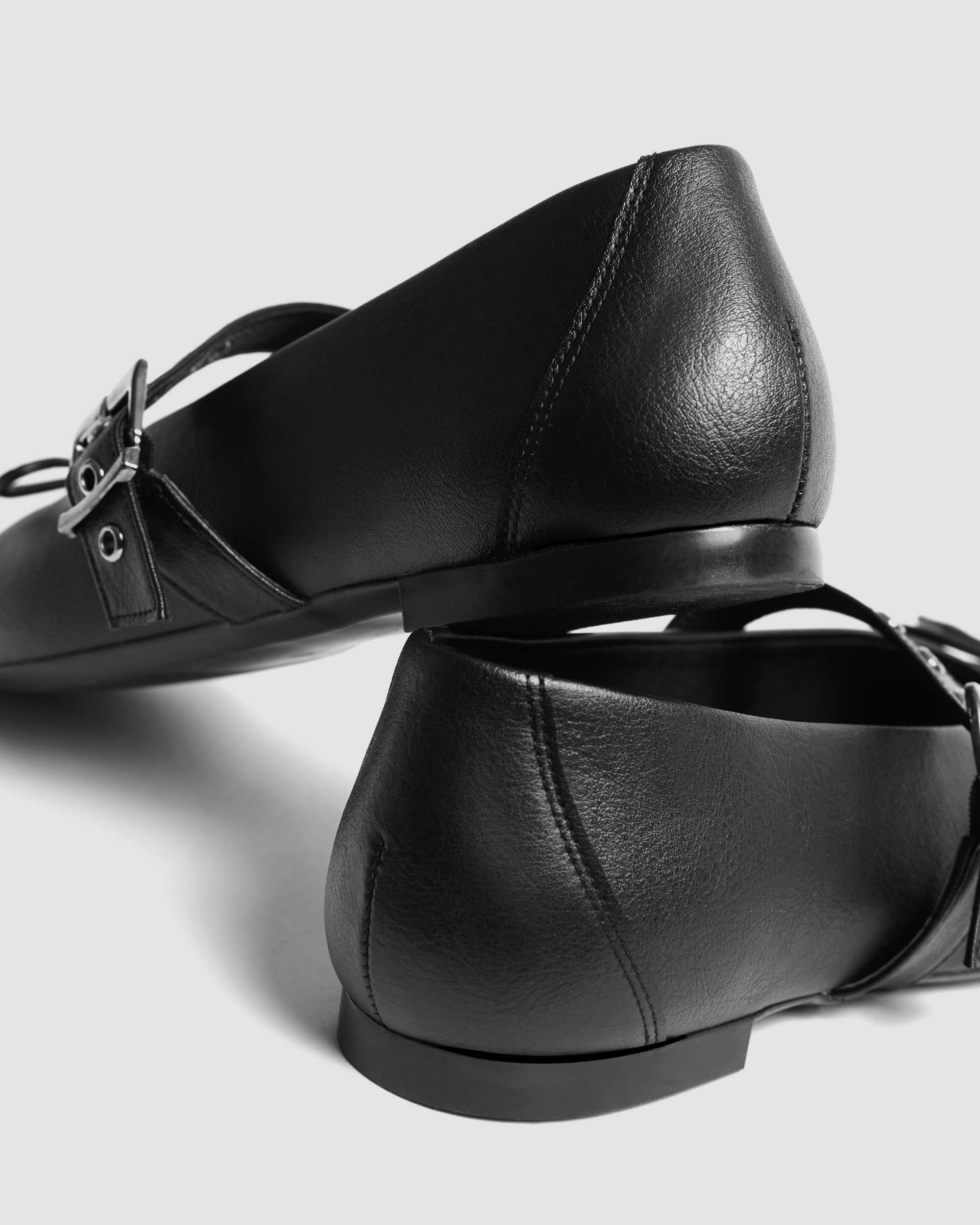 BOHEMA Mara Pumps in black - back view of women's ballet flats with strap