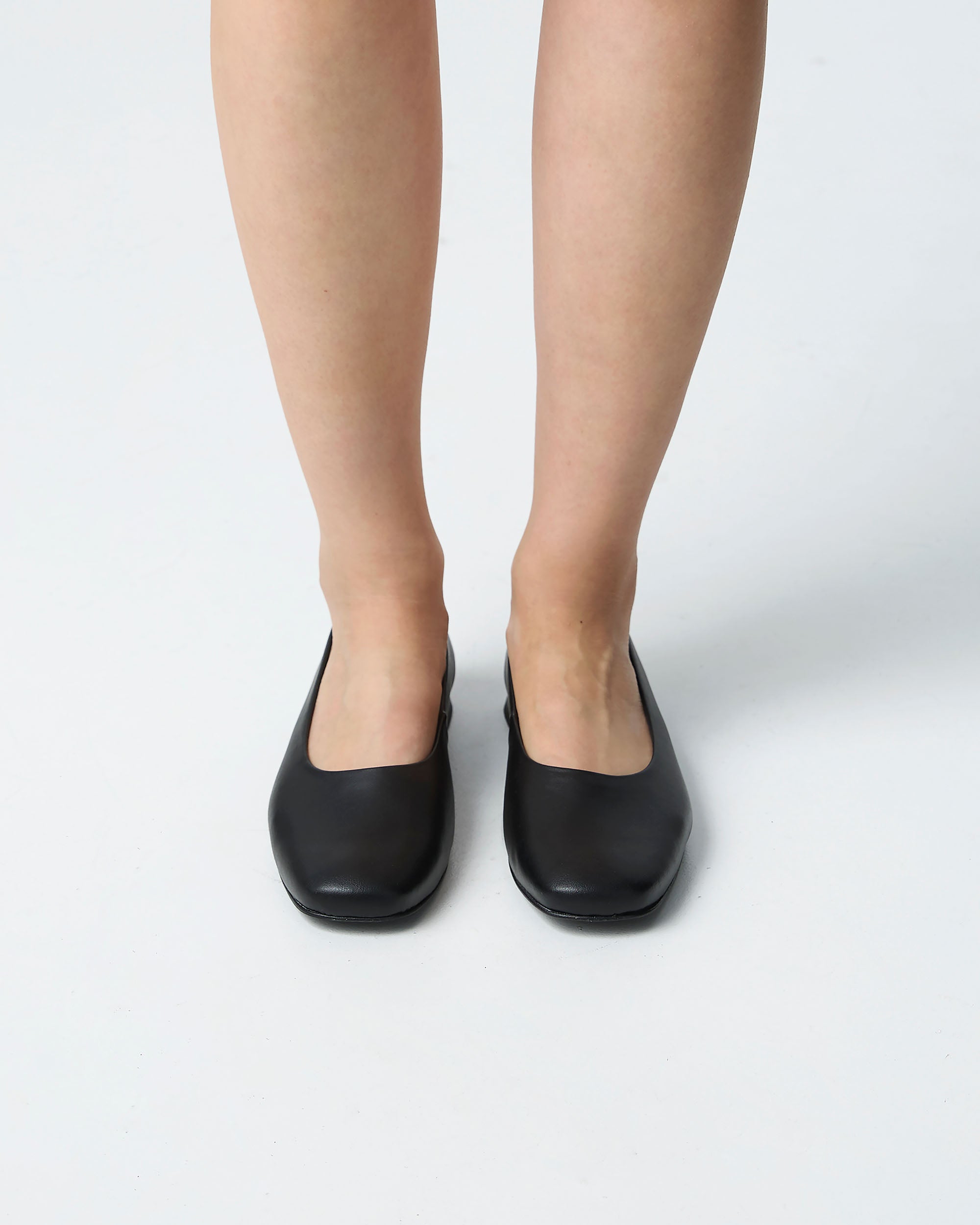 BOHEMA Black Diana Pumps in black - back view of women's square-toe ballet flats