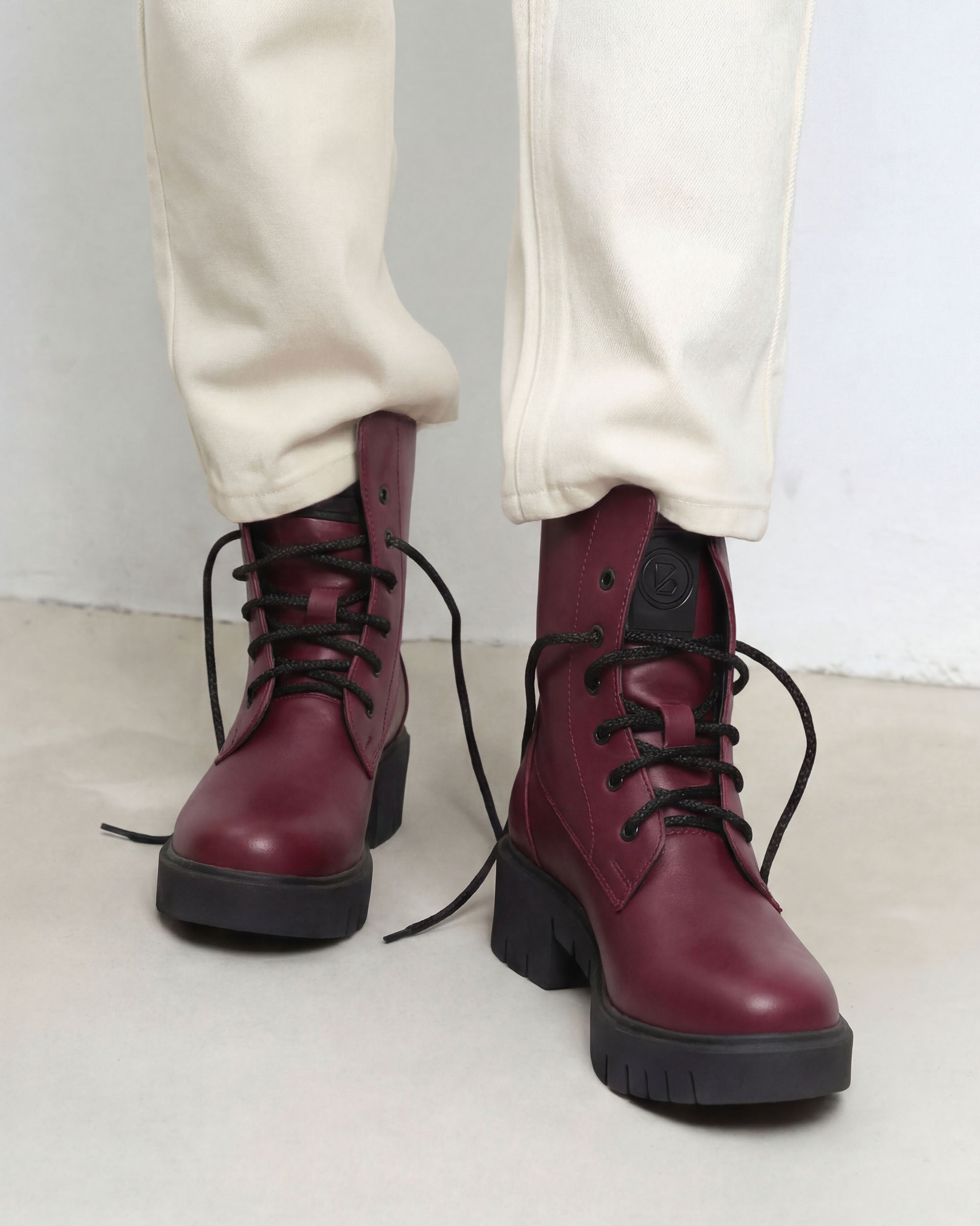 BOHEMA Workers No. 3 in burgundy - worn on foot of women's lace-up boots