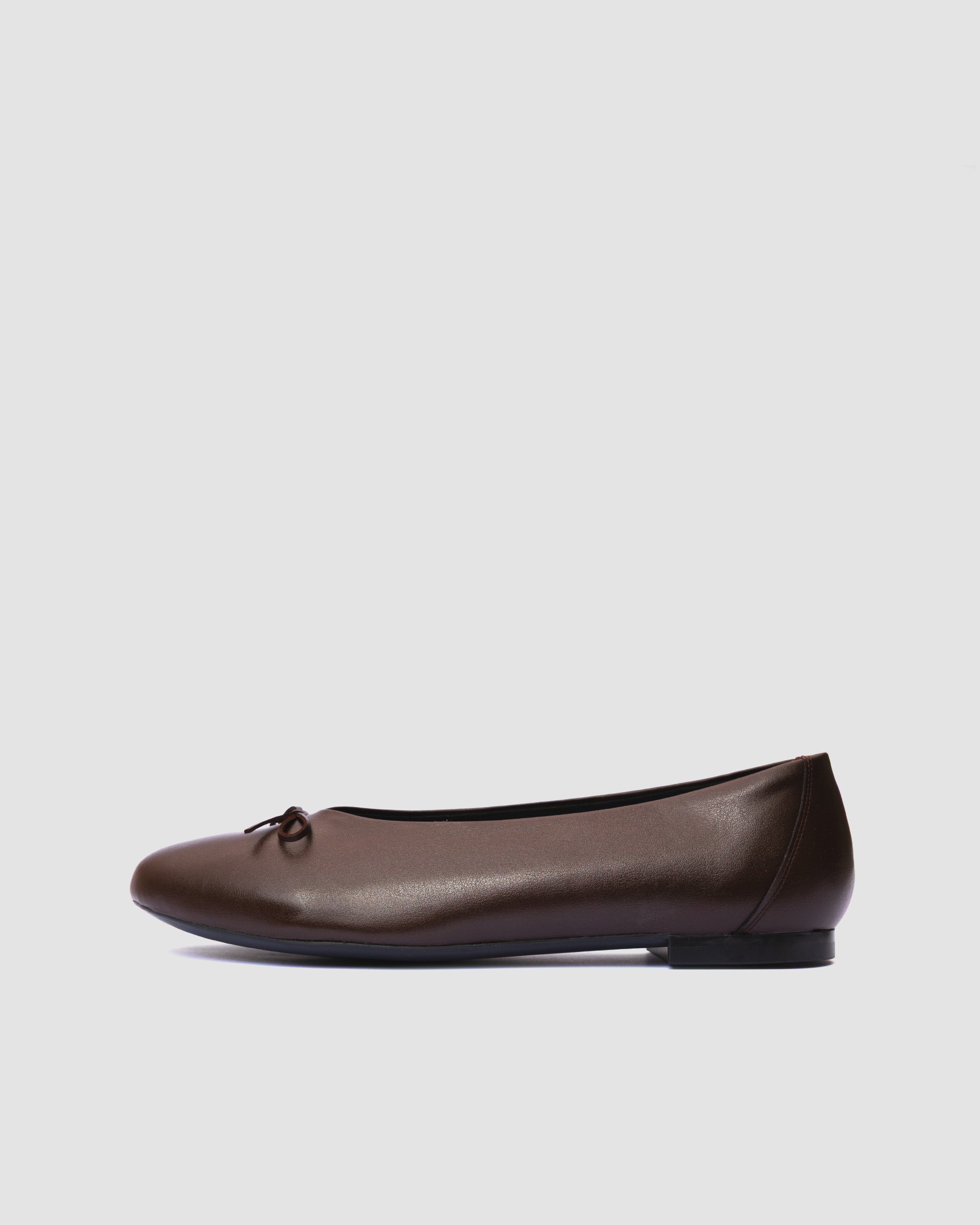 Minimalist brown vegan ballet flat from Bohema on a white background