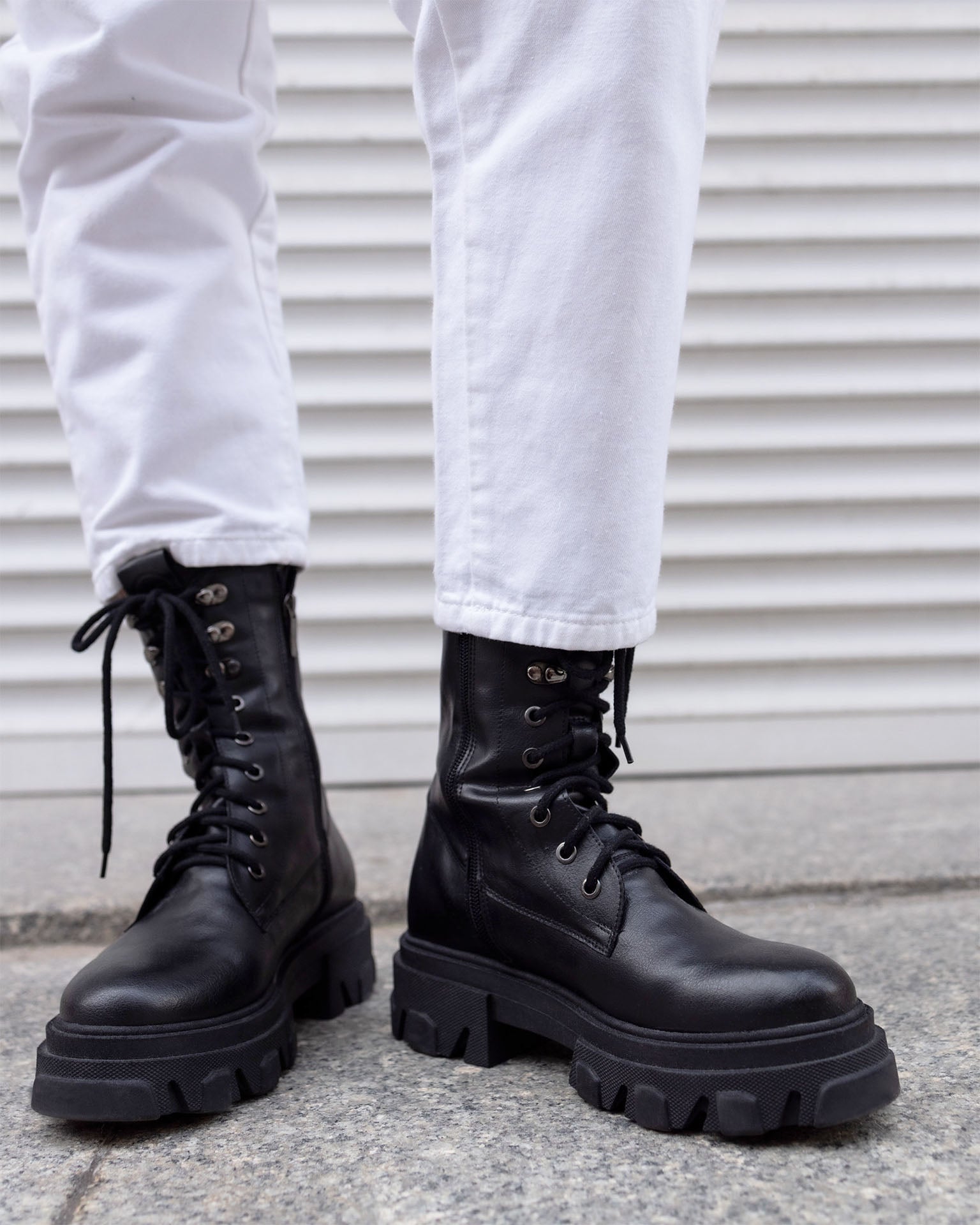 BOHEMA Combat Boots in black - side view of women's combat boots