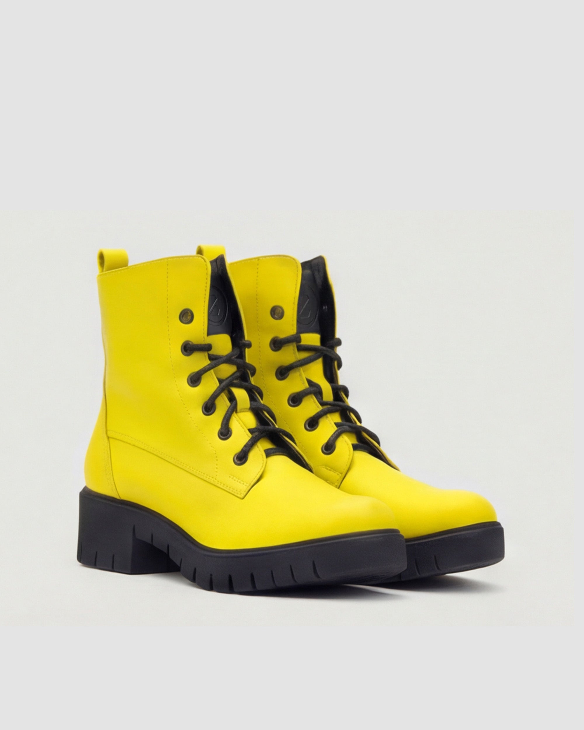 BOHEMA Workers No. 3 in yellow - worn on foot of women's lace-up boots