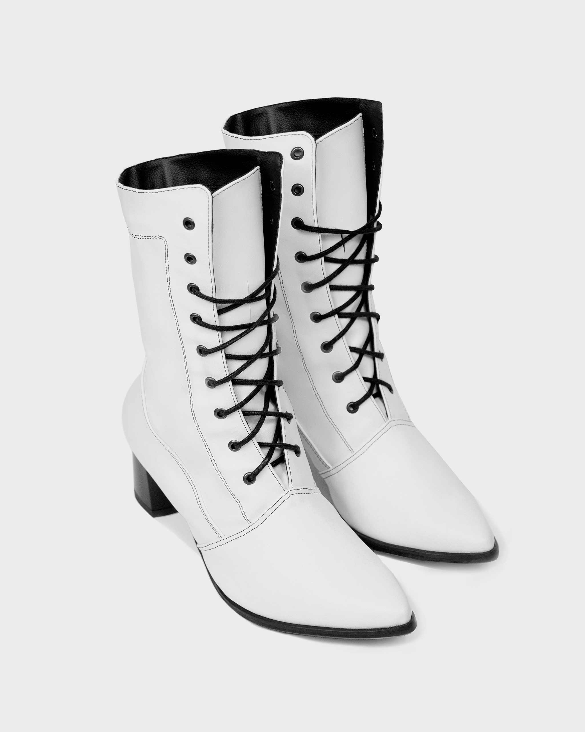 BOHEMA High Boots in white - side view of women's knee-high boots