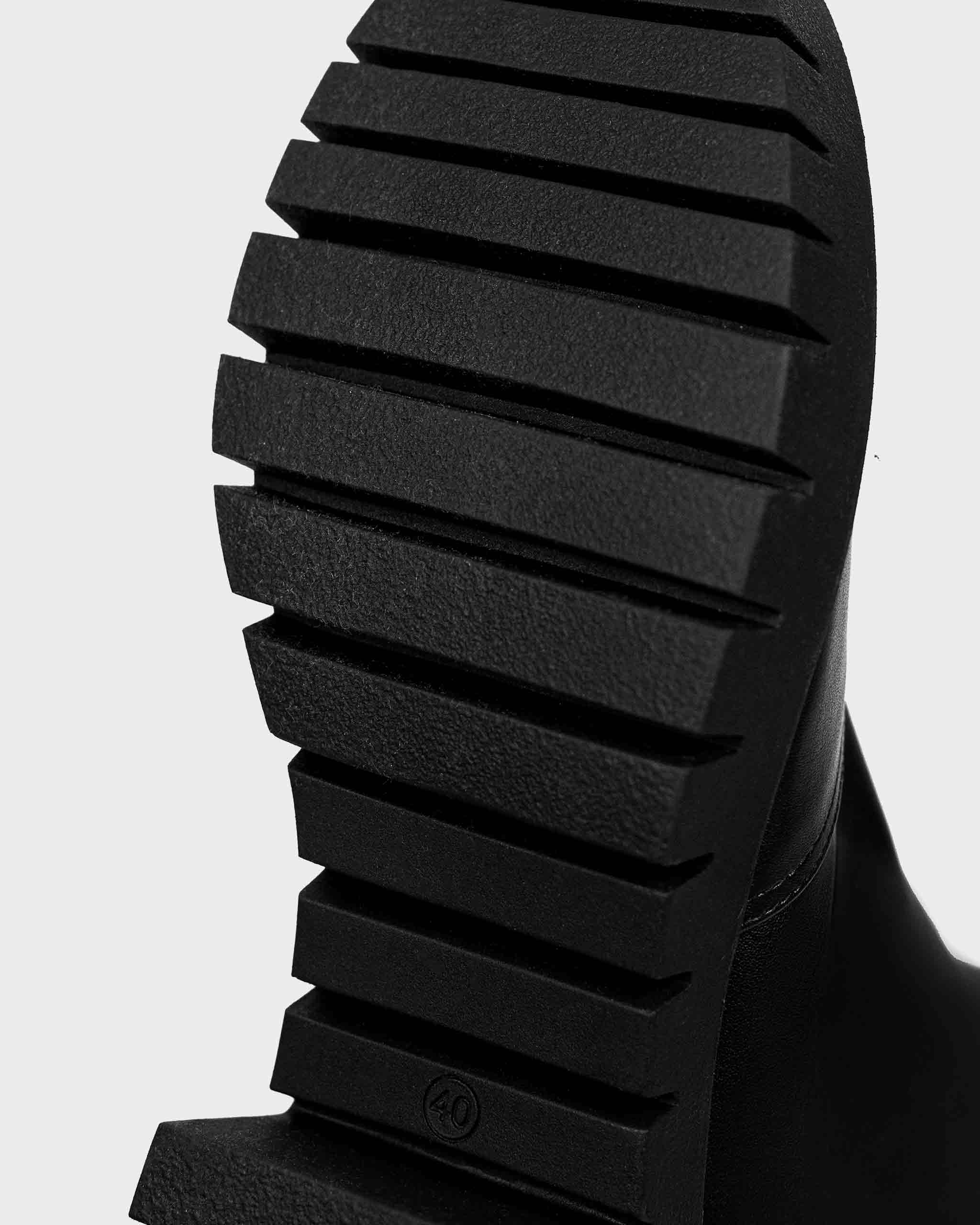 BOHEMA Cyber Boots in black - back view of women's ankle boots